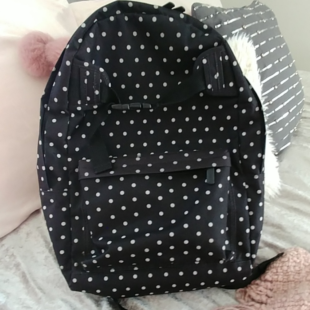 Super cute black and white polka dot backpack